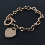 Charm heart bangle bracelet for women with rolo chain and toggle clasp in titanium steel