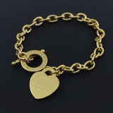 Gold-tone charm heart bangle bracelet with rolo chain and toggle clasp for women wedding jewelry