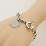 Silver charm heart bangle bracelet for women with rolo chain and toggle clasp made of 316L titanium steel