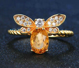 Natural oval citrine bee wedding ring with silver band and diamond accents