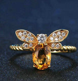 Natural oval citrine bee design silver wedding ring for women with prong setting and diamond accents