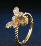 Natural oval citrine bee wedding ring for women in sterling silver with prong setting and classic style