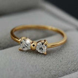 Princess zircon gold ring for women with bowknot design and bezel-set stones