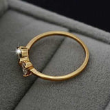 Princess Zircon Gold Ring for women with 18k gold plating and bowknot design, wedding jewelry with bezel setting.