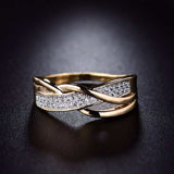 Twisted gold zircon ring for women with prong setting and round zircon stones, 14k yellow gold plated engagement promise jewelry.