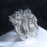 White sapphire gemstone cocktail ring for women in silver with round prong setting, ideal for weddings and engagements
