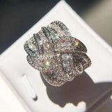 White sapphire gemstone cocktail ring for women in silver with prong setting and round design for wedding and engagement