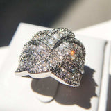 White sapphire gemstone cocktail ring for women in silver with round prong setting for wedding and engagement