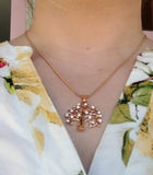 Rose gold Tree of Life pendant necklace for women on a snake chain, trendy plant-shaped jewelry statement