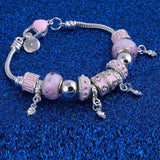 Charm pink zircon silver charm bangle bracelet for women with lobster clasp and plant pattern beads on blue background