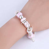 Women's charm pink zircon bangle bracelet with silver link chain and lobster clasp