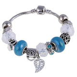 Silver charm bracelet with blue and clear zircon beads and leaf pendant for women