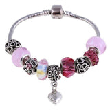 Charm pink zircon bangle bracelet for women with silver link chain and lobster clasp, featuring decorative beads and heart charm.