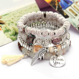 Vintage wristband beaded bracelet for women with charm pendants and silver accents