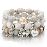 Vintage wristband beaded bracelet for women with silver charms and bohemian style