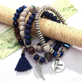 Vintage wristband beaded bracelet set for women featuring silver charm accents, round acrylic beads, and bohemian style elements.