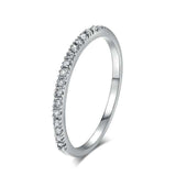 Luxurious women's engagement ring with round zircon stones in 18K rose gold plating and tension setting