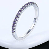Luxurious engagement zircon ring for women with 18K rose gold plated band and purple stones in a tension setting