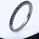 Luxurious women’s engagement zircon ring in 18K rose gold plated with purple stones.