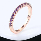 Luxurious engagement zircon ring in 18K rose gold plating with purple stones for women.