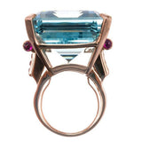 Rose gold ring with large rectangular aquamarine stone and small purple zircon accents for women