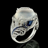 Vintage opal cat eye ring with hollow silver feather design and large oval stone for women