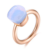 Natural blue topaz ring in 14K rose gold with round tension mount setting for women wedding jewelry