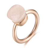 14K rose gold women’s ring with natural blue topaz stone, classic wedding jewelry design
