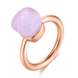 Natural Blue Topaz Ring in 14K rose gold with a round tension-set blue topaz stone for women wedding jewelry