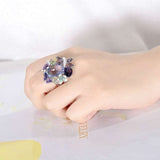 Luxury flower amethyst ring with purple gemstone and floral design on hand