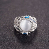 Vintage opal cat eye ring with silver feather design and blue stone accents for women wedding jewelry