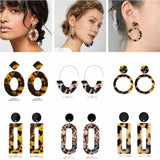 Collection of trendy geometric acrylic drop earrings for women in various tortoiseshell patterns and colors.