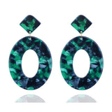 Trendy geometric drop earrings for women in green and black acrylic resembling luxury silver drop earrings for wedding jewelry
