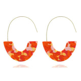 Trendy geometric acrylic drop earrings in orange and pink tones with silver hooks for women.