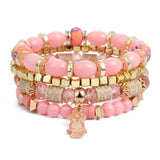 Vintage wristband beaded bracelet for women with pink and gold beads and charm detail