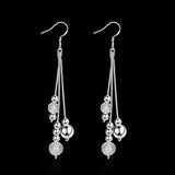 Long silver dangle earrings for women with multiple silver beads and water drop design on hooks, wedding jewelry style