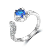 Silver plated romantic tail gemstone ring for women with a blue zircon fox-shaped stone and tension setting decorated with small crystals