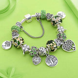 Tree of Life Charm Bracelet for women with silver beads, green zircon accents, heart and plant charms on beaded chain